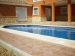 Covered porch and pool area