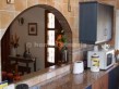 Kitchen with arch to lounge